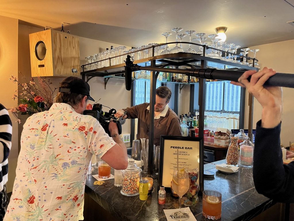 07 Dante Pouring A Drink For The Camera Large