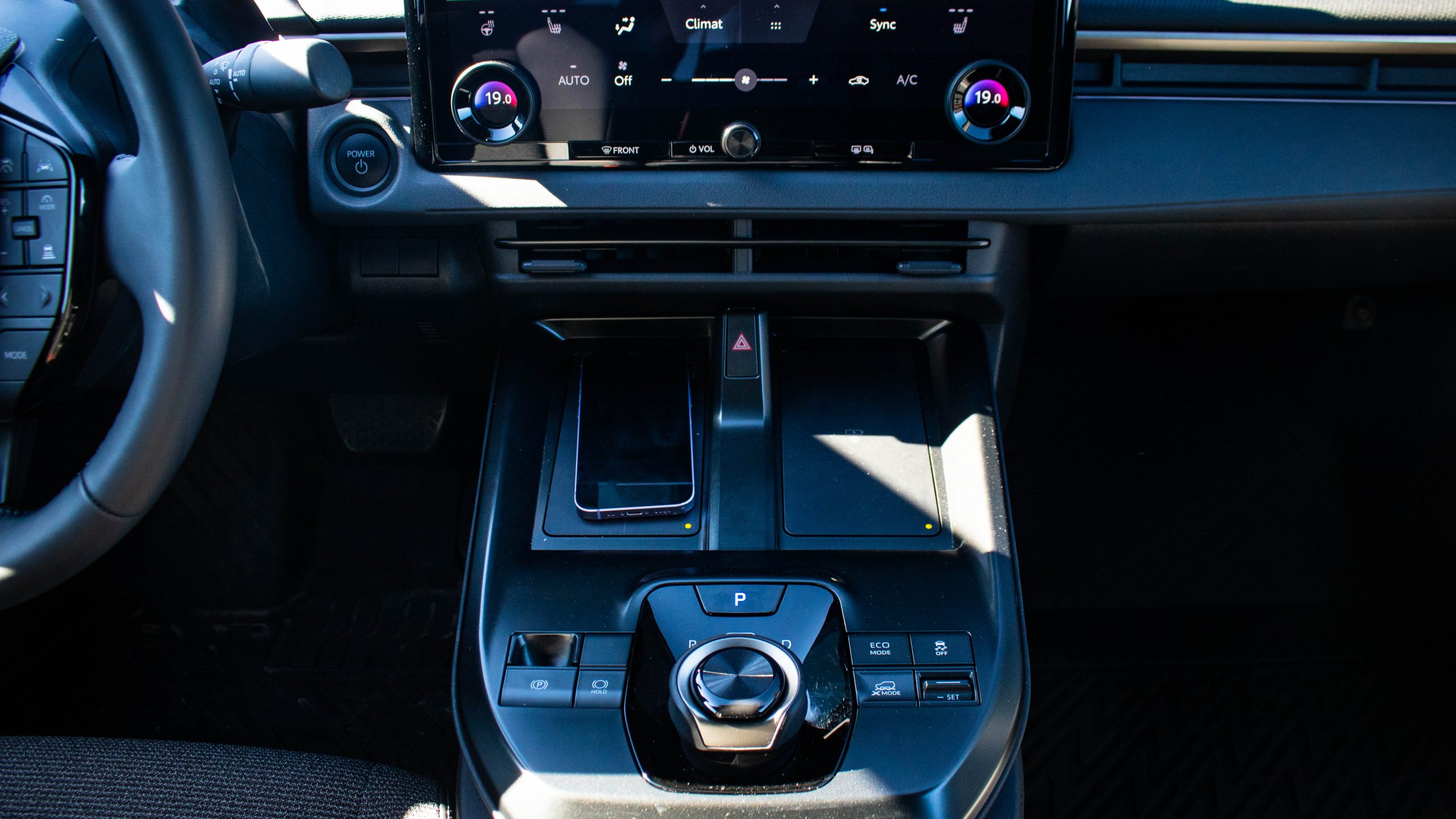 console with dual wireless smartphone chargers