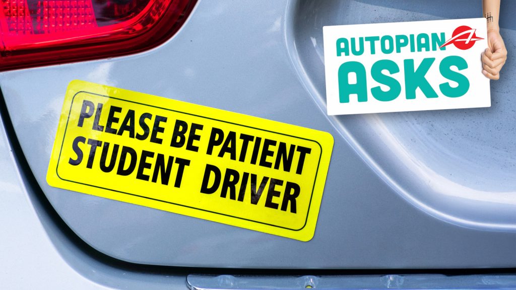 Please Be Patient Student Driver Yellow Bumper Sticker On The Car.