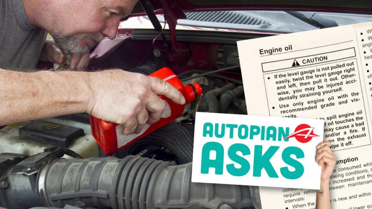 Man Changing The Oil