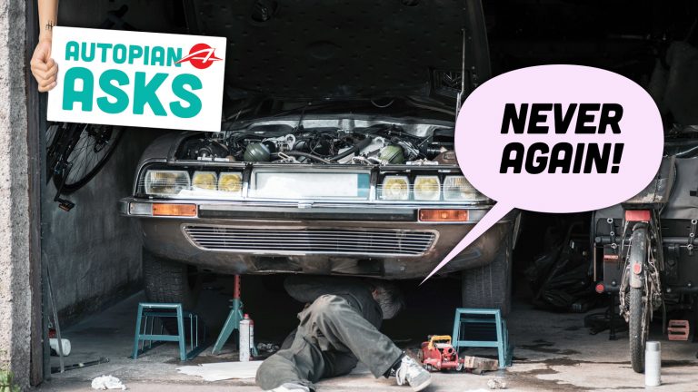 Repairing Old Car In A Home Garage.