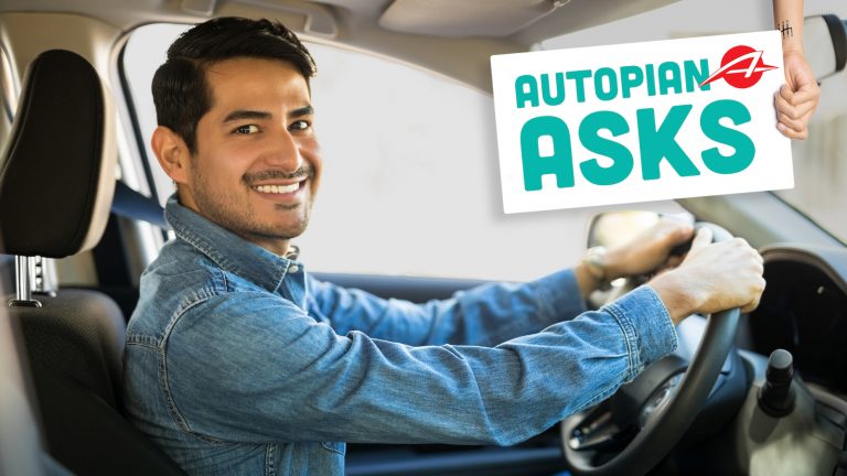 Attractive Man Driving A Car
