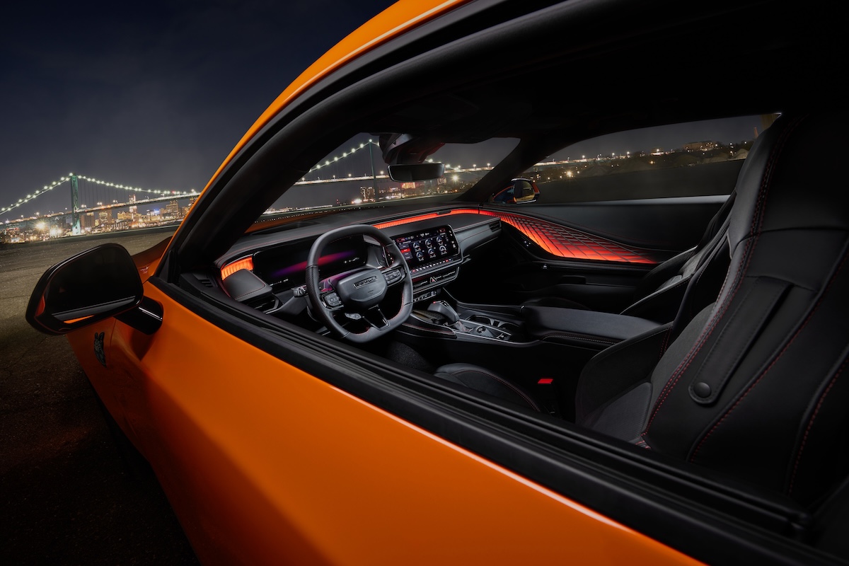 Interior Of 2026 Dodge Charger Scat Pack Plus Powered By The Turbocharged Sixpack High Output (h.o.) Engine, Shown With Attitude Adjustment Lighting.