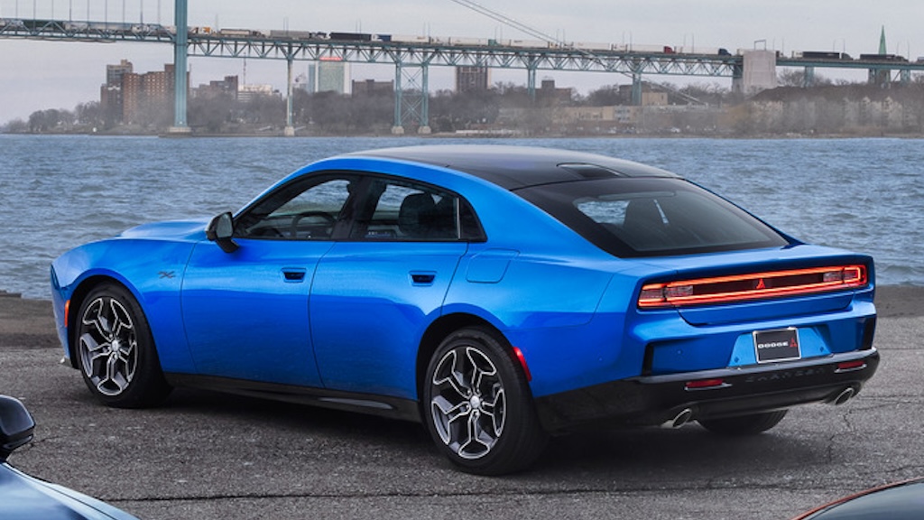 2026 Dodge Charger Models, Including (clockwise From Front) The Sixpack Powered Dodge Charger Scat Pack Plus In Peel Out, All Electric Dodge Charger Daytona Scat Pack Plus In After Dark, Sixpack Powered Dodge Charger R/t Plus In Bludicrous And All Electric Dodge Charger Daytona Scat Pack Plus In Triple Nickel.