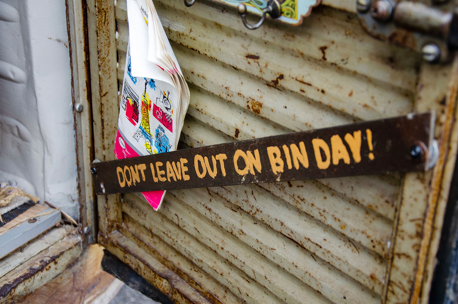 The interior of a Citroen AK350, showing lots of memorabilia