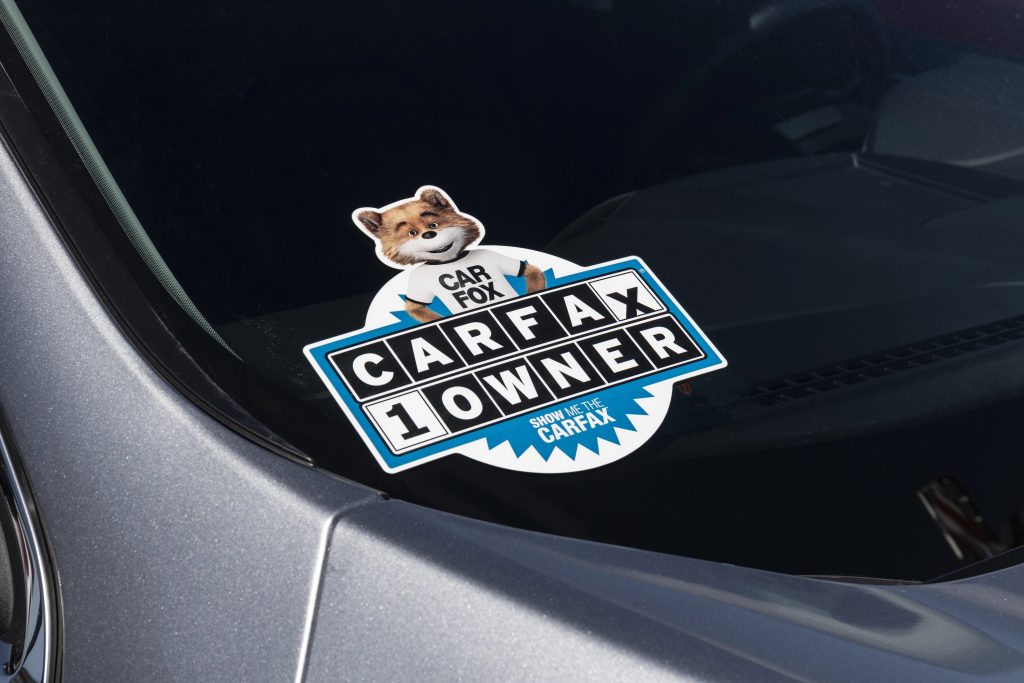 Plainfield Circa April 2021: Carfax Sticker On A Used Pre Owned Vehicle. Carfax Provide Vehicle Reports For Prospective Buyers That May Reveal Problems.