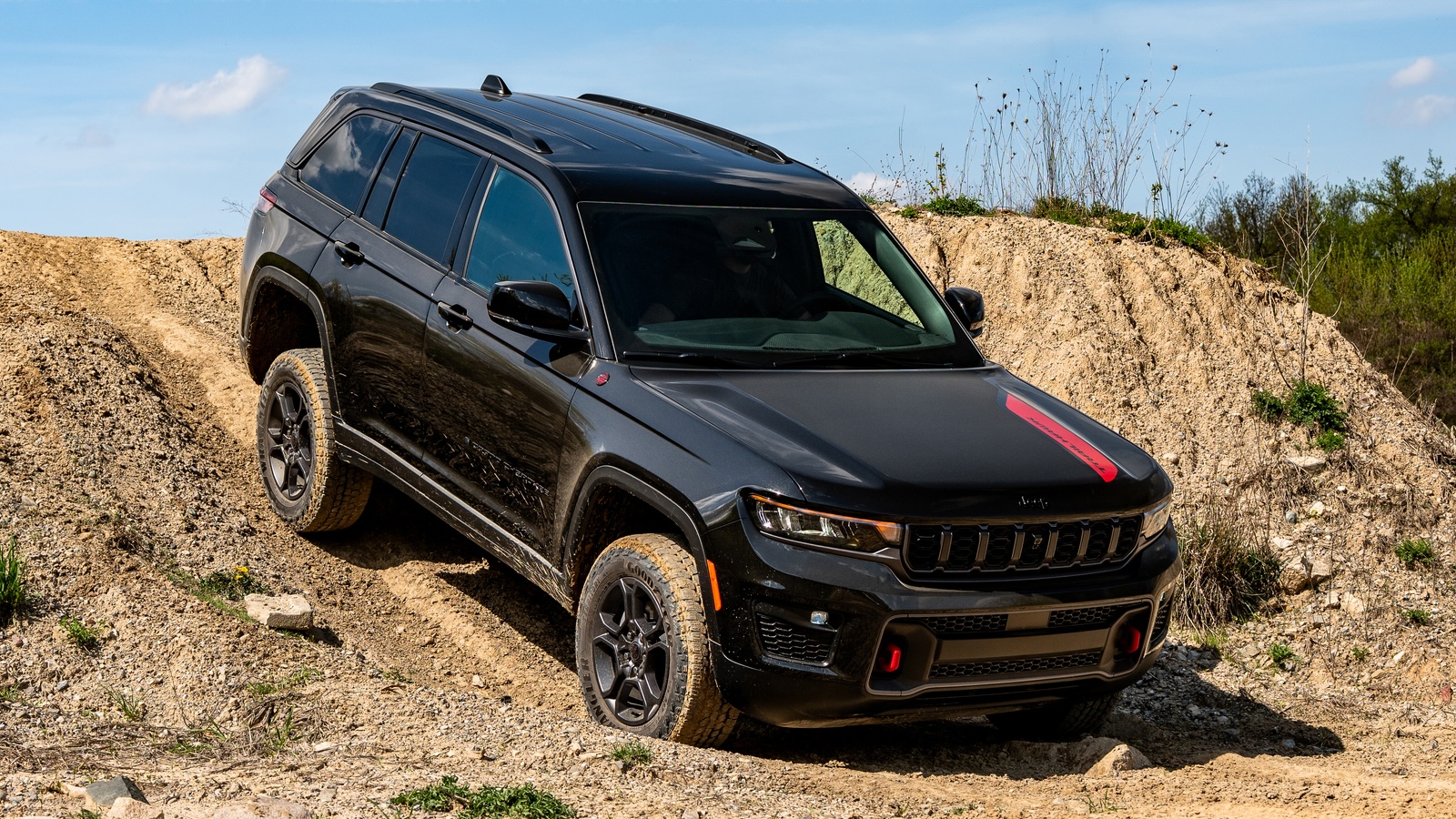 The 2027 Jeep® Grand Cherokee Trailhawk Descending A Dirt Hill.