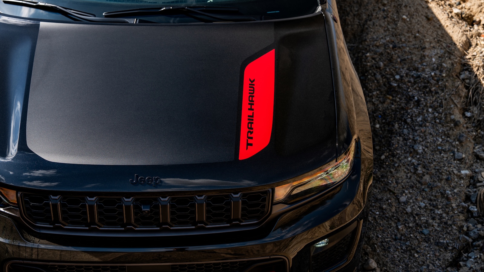 The 2027 Jeep® Grand Cherokee Trailhawk's Glare Resistant Hood Decal.