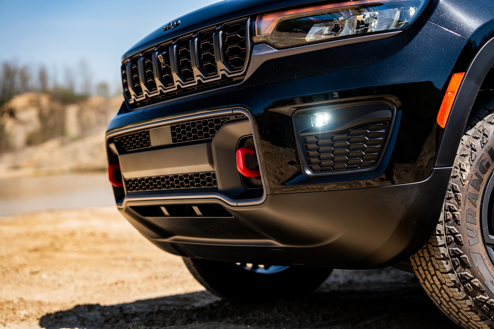 The Jeep® Grand Cherokee Trailhawk's Red Tow Hooks.