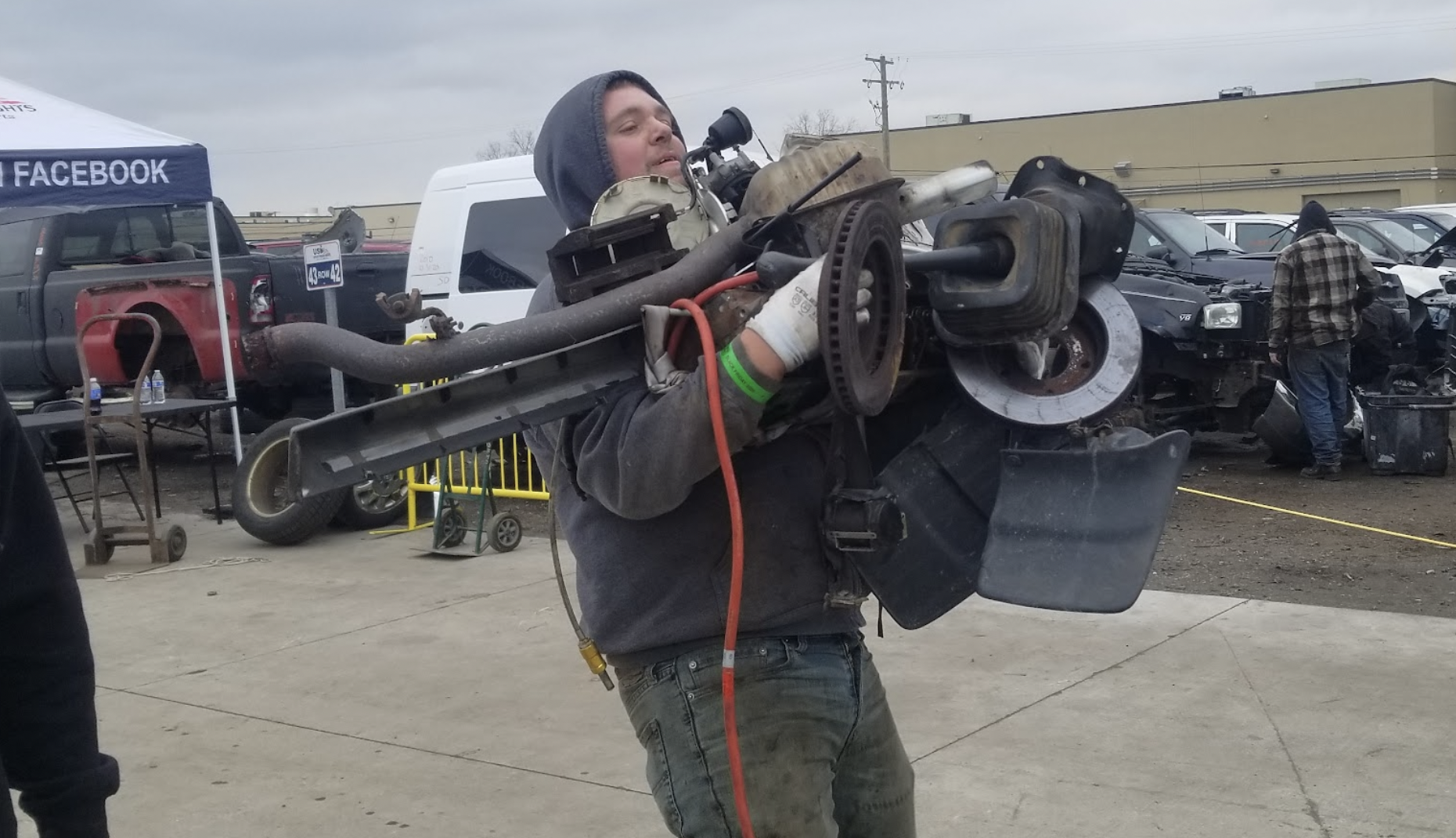 Watch In Awe As These Men Carry 300 Pound Engines And 500 Pound Axles On Their Backs To Save Money At A Junkyard - 75