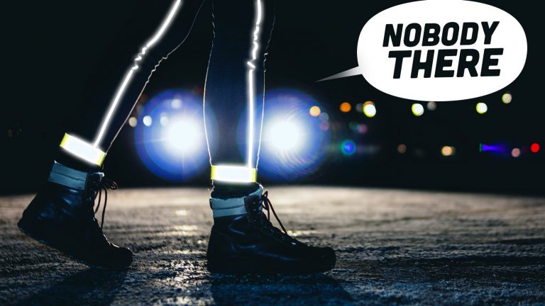 Girl Crosses The Road At Night. Reflective Bracelet. Winter Road