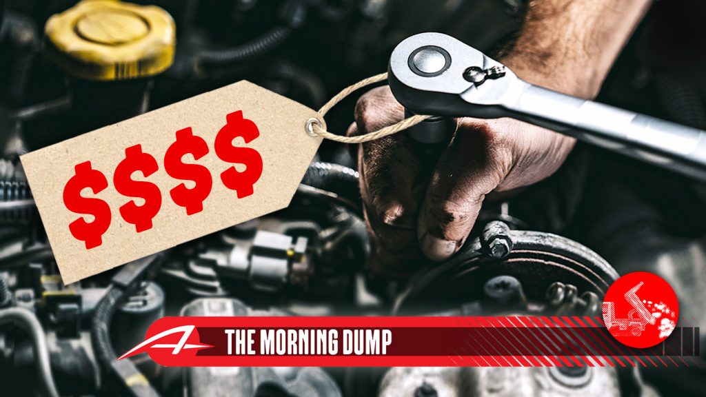 Auto Mechanic Working In Garage. Repair Service.